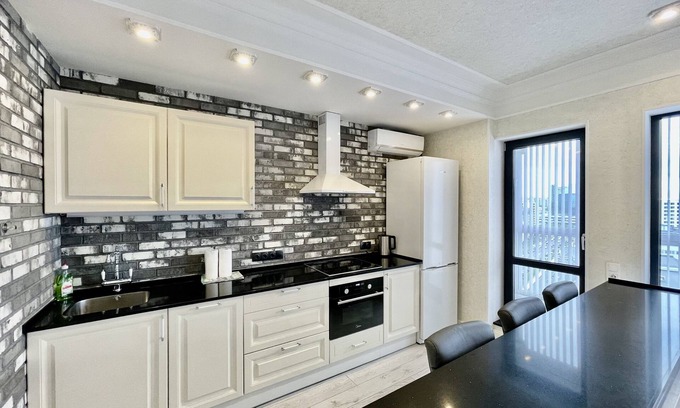 Pervomaysky District Apartamento | HomeApart Peter Mstivlavets 15