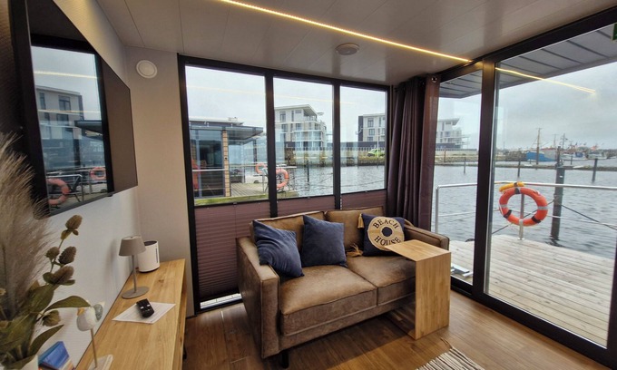 Wendtorf Alquiler De Eote | Houseboat Fjord Cumulus with bio sauna and roof terrace in Wendtorf/ Kiel Fjord