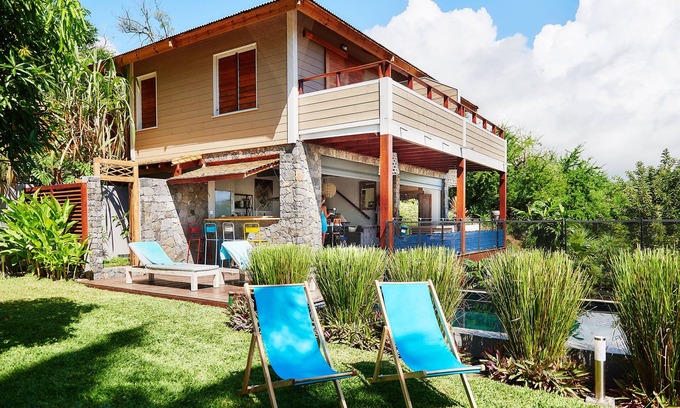 Cap Champagne Villa | La villa Paille en Queue 4 *: Villa de lujo con vistas al mar piscina en Saint-Gilles