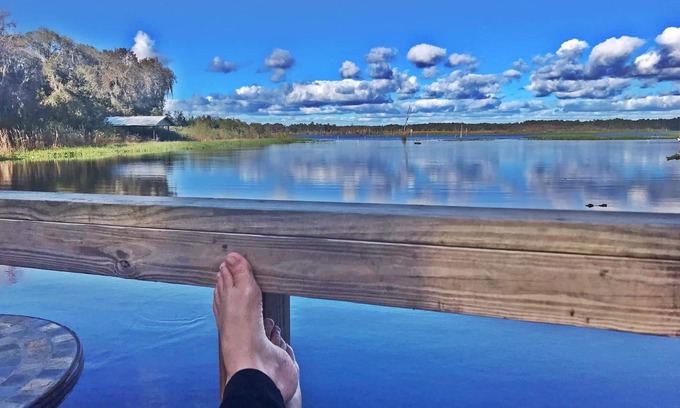 Citrus Springs Casa | Lakefront Getaway! Relax Spa Dock Kayaks Firepit Handicap Friendly