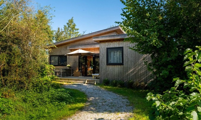 Grou Cabina | Lakefront Nature House with own shared dock in Friesland: Ljurk
