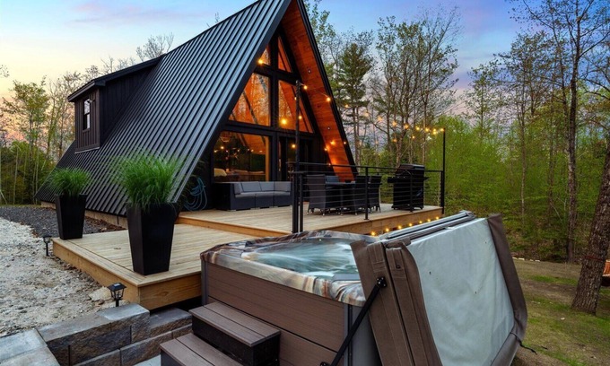 Sebago Casa | Modern A-frame house with hot tub and fire pit. Very private!