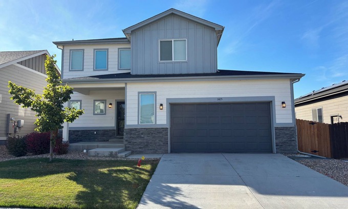 Milliken Casa | Modern home with a large fenced yard, and garage access