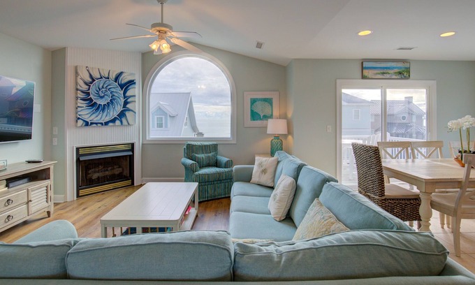 Village of Stump Sound Casa | Ocean-view 2-story home with fireplace, community outdoor pool & tennis court