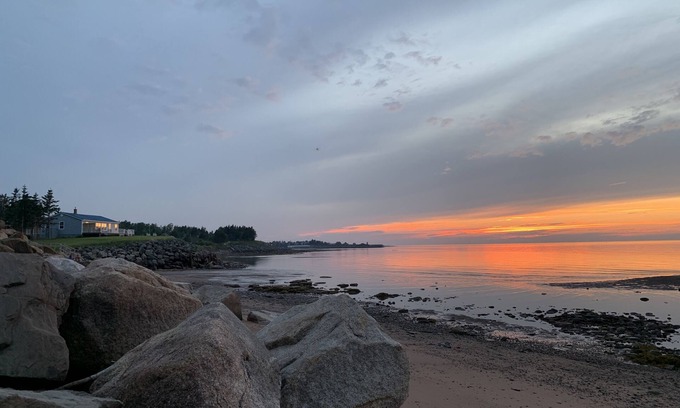 Pictou County Cabaña | Oceanfront beach cottage panoramic views spectacular sunsets sandbars warm water