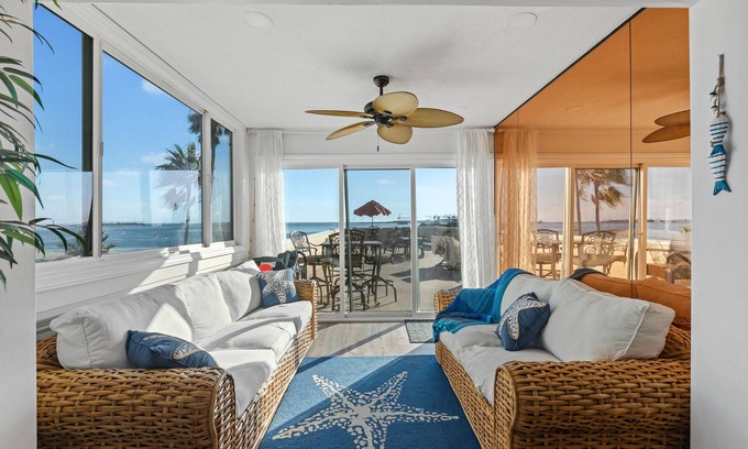 Alamitos Beach Casa | Oceanfront retreat with rooftop deck, modern interior, marble finishes, & W/D
