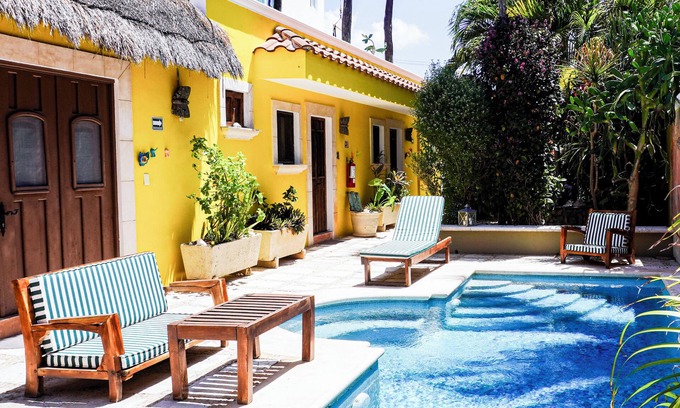 Colonia Salina Chica Apartamento | Suite de un dormitorio, sereno, piscina, jardines, terraza en la azotea con vistas