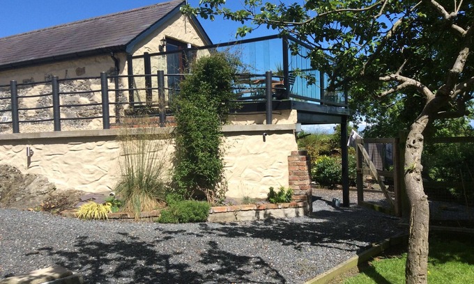 Newtownards Cabaña | Orchard Cottage granero conversión retiro romántico