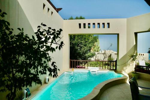 Ras Al Khaimah Casa | Private guest house in five stars resort