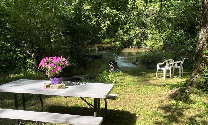 Maryville Casa | Relax while listening to a Natural Waterfall from your Private Park!