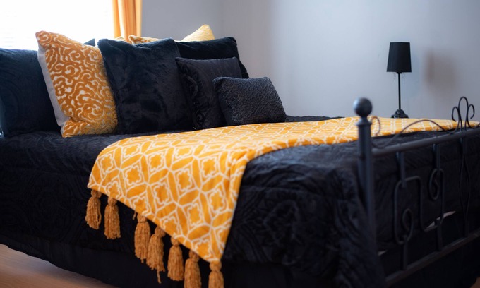 Holly Springs Cabaña | Remodeled historical loft walking distance from the Square.