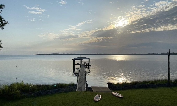 Hobucken Casa | Riverfront property with dock and ramp. Dolphins, fish, boat, swim & more