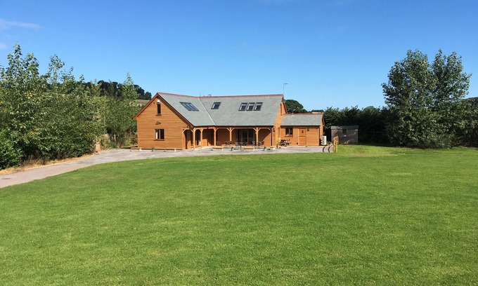 Old Cleeve Cabaña | RIVERSIDE LODGE, pet friendly, character holiday cottage in Washford