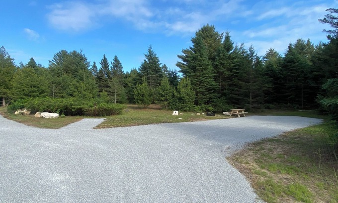 De Tour Village Alquiler De RV | Rustic campground in De Tour Village with Large secluded lots. Site A