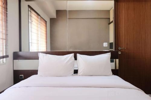 Cileunyi Apartamento | Spacious 3BR Combined Unit at Pinewood Apartment By Travelio