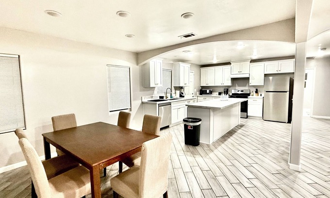 Baker Street Casa | Spacious 4-bedroom house in charming Bakersfield with AC. 4 queen & 3 twin beds.