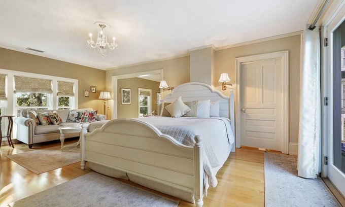 Sturgeon Bay Hotel | Spacious King bed suite with private balcony.