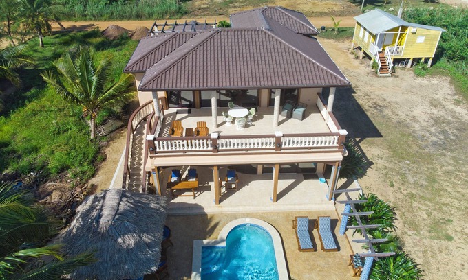 Río Sittee Villa | Spectacular Oceanfront 3/3 Villa with Private Beach, Pool, and Dock