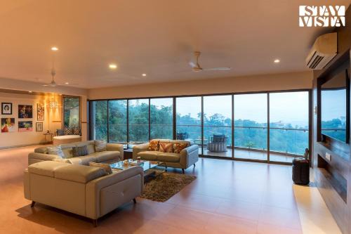 Kune N.m. Villa | StayVista at Airhill with Pool, Bonfire, WiFi