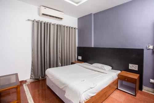 Mylapore Tiruvallikk Hotel | Stayz Inn Mylapore near light house