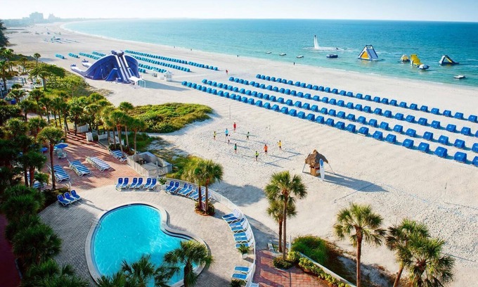 St. Pete Beach Hotel | Steps Away from the Beach! 2 Rooms with Tropical Views, Outdoor Pools!