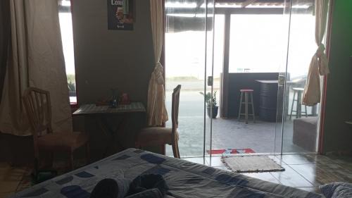 Praia Grande Apartamento | Suíte frente mar