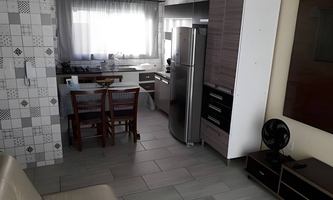 Ressacada Apartamento | Suite TEN air conditioning and kitchen