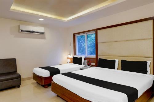Valasaravakkam Hotel | Super Townhouse Arcot Road Near Kauvery hospital