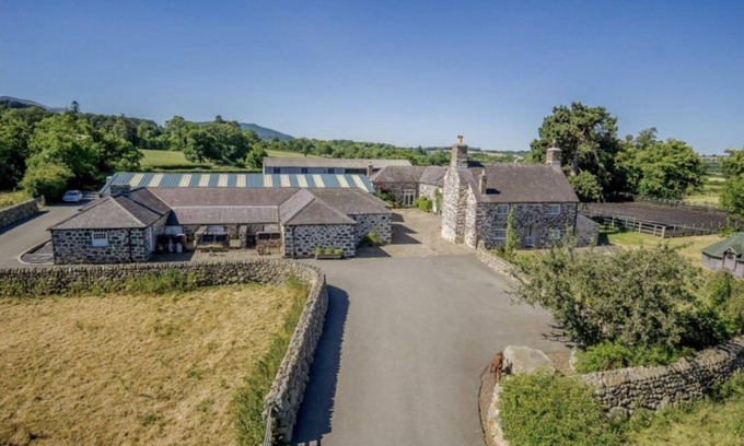 Bangor Cabaña | Tal y Bont Farm - a remote that sleeps 30 guests in 14 bedrooms