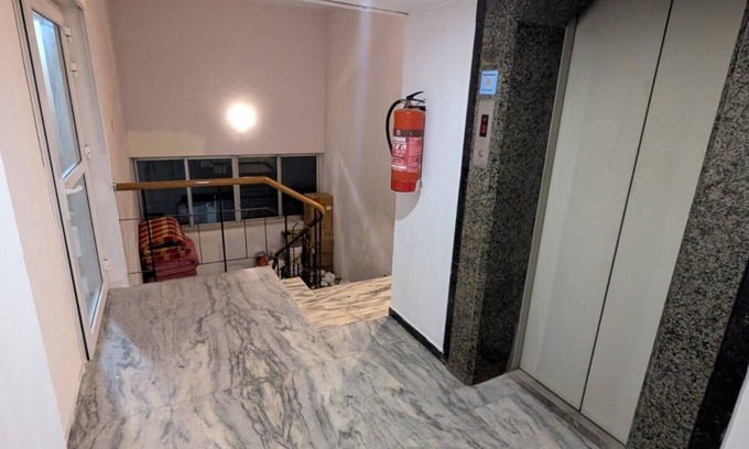 Madurai Apartamento | The Madurai lounge-over looking Meenakshi temple. top floor of hotel Padmam