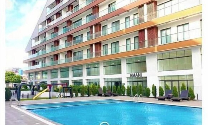 East Legon Apartamento | The Signature Hotel queen studio with balcony #8