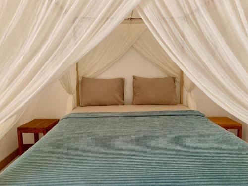 Rua Hotel | the village rua beach homestay