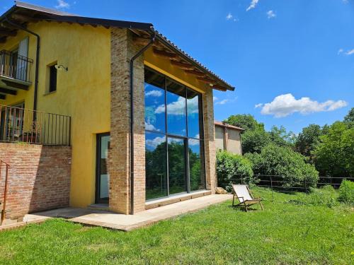 Capriglio Casa | The Window on the Forest View