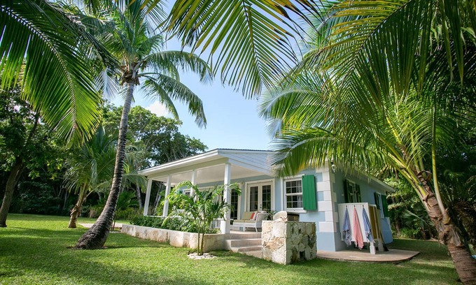 Dunmore Town Cabaña | Casa de Touchstone en la playa - Propiedad tropical de 1 acre