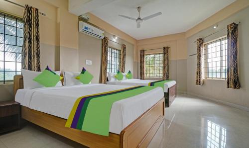 Kushalnagar Hotel | Treebo Green Land Kushalnagar
