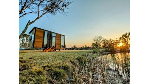 Burrum River Casa | Turtle Island Lakeside Tiny House by Tiny Away