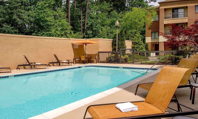 Durham Hotel | Unwind in 4 Classic Units W/ FREE Parking in Durham! Pets Allowed, Pool!