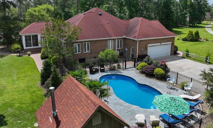 Pinecrest Casa | Waterfront Mansion w/ Saltwater Pool, Dock, Game room, Tiki Bar, Kayaks + More