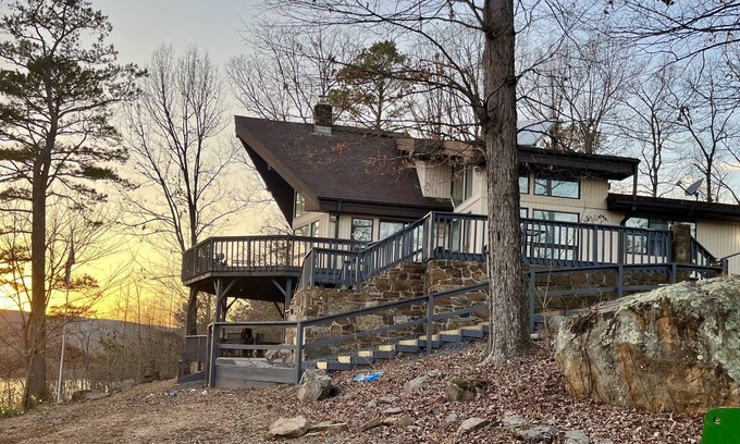 Center Ridge Casa | Watershed Getaway on lake, mountain behind house on property, and hiking trails