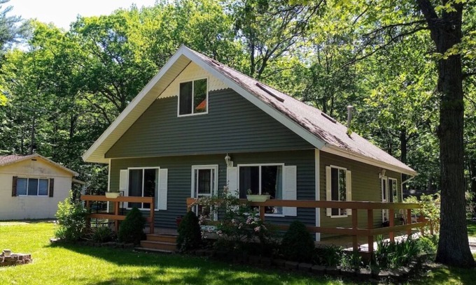 Caseville Cabaña | ‘Whispering Oaks’ Cottage with Private Lake Access, Outdoor Fire Pit and More!
