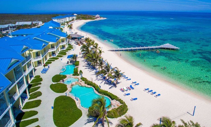 Colliers Bay Condominio | Wyndham Reef Resort 1 y 2 dormitorios de bloqueo 2 baños Planta baja frente a la playa EastEnd