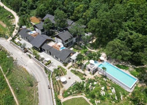 Huaxi Hotel | Xunmiri Qinin Villa