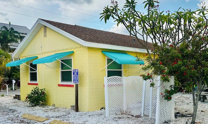 Sunset Beach Casa | Yellow Beach House on Treasure Island with Central AC, One block from Beach