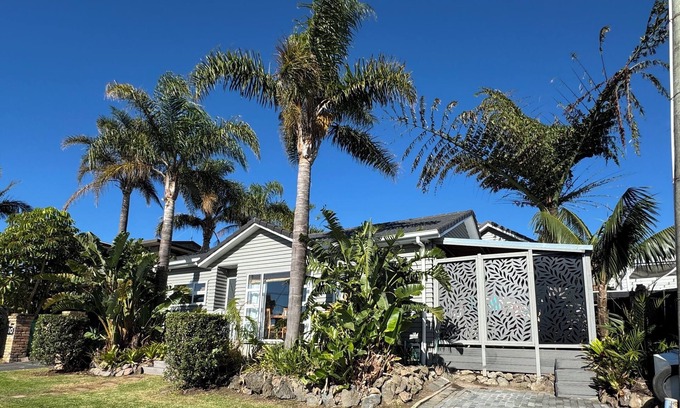 Browns Bay Cabaña | Your coastal escape. Walk to the beach. Private spa, whole house access.