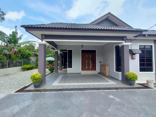 Kampung Kubang Tangga Casa | Zahani Homestay