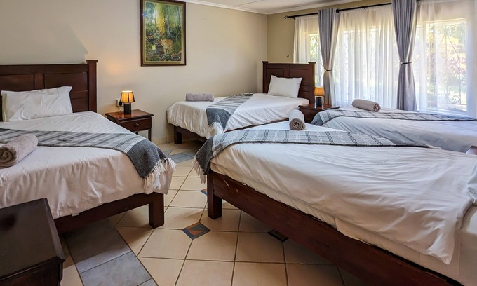 Victoria Falls Villa | Zambezi Family Lodge - Leopard Room