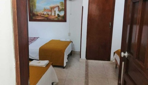 Habitación triple familiar, varias camas