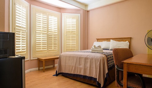 Standard Room, 1 Queen Bed (Shared Bathroom)