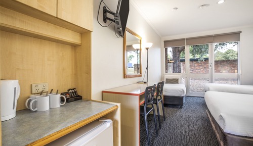 Estudio familiar, varias camas