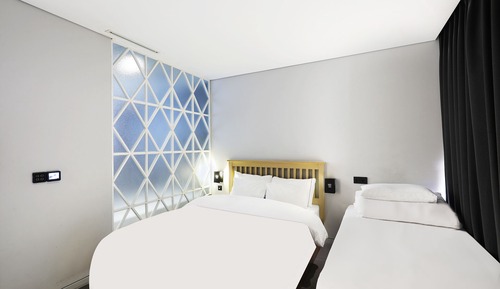 Habitación familiar con 2 camas individuales